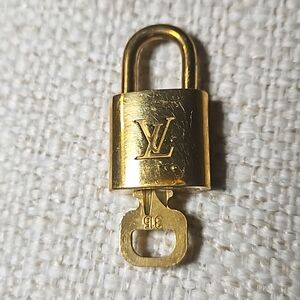 #315 louis vuitton padlock and key set